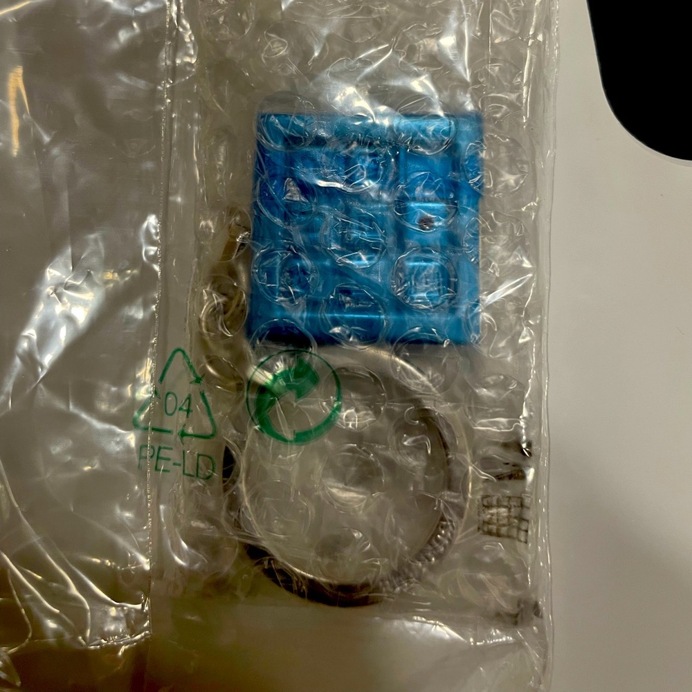 Supreme Puzzle Keychain